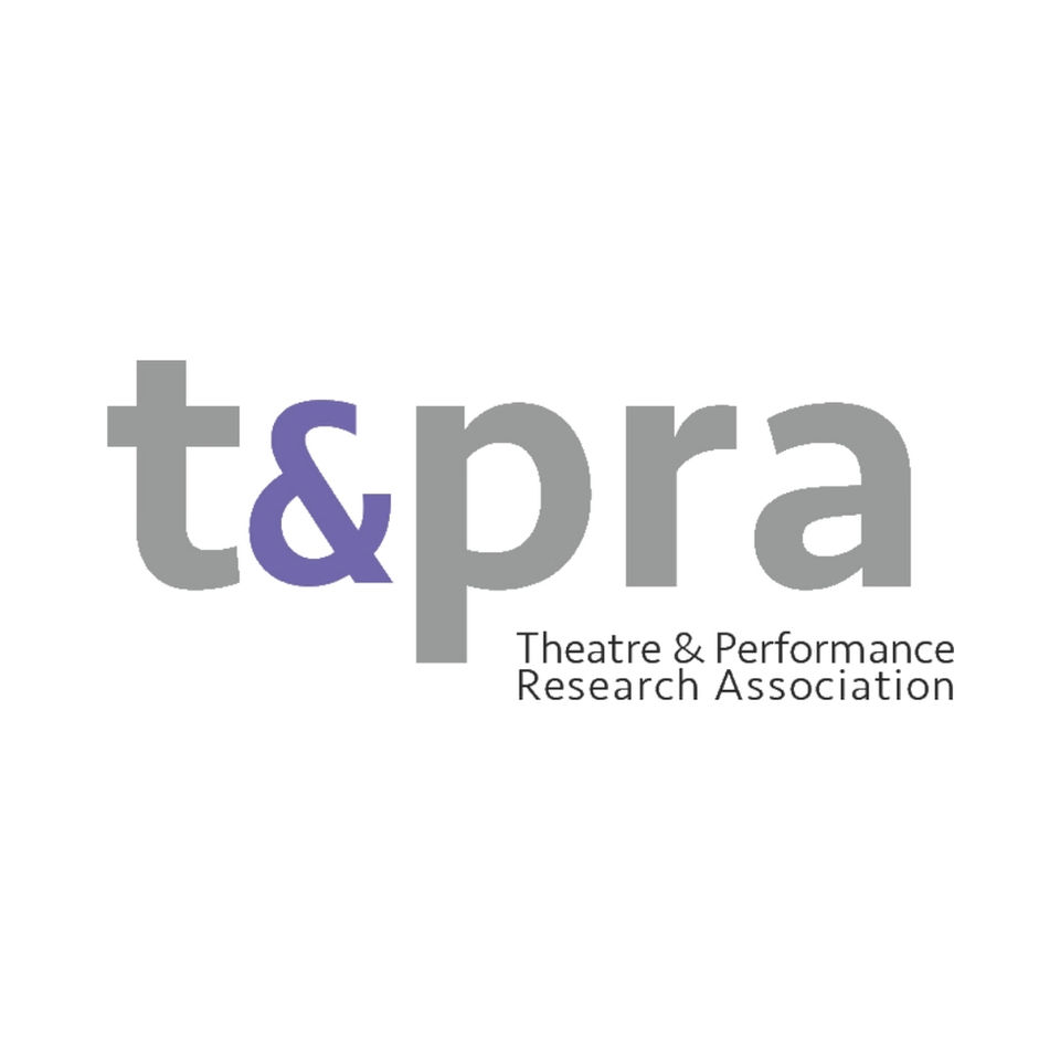 This image shows a logo for "t&pra" (Theatre & Performance Research Association). The letters are in a gray lowercase font, with the ampersand (&) highlighted in purple. Below the main text is the full name of the organisation in smaller font.