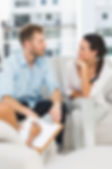 Unhappy couple talking at therapy session in therapists office.jpg
