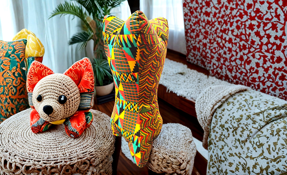 Thumbnail: Made with two different multi- colored African fabrics neck bone shaped pillow