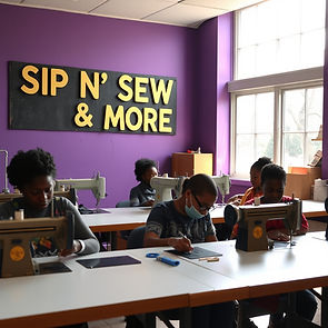 SIP N' SEW & MORE sign on the wall. a sewing studio with black people & children sewing a 