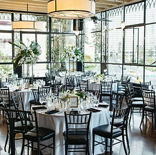 Elegant wedding dinner reception setup inside The Terrace Room ballroom in Oakland.