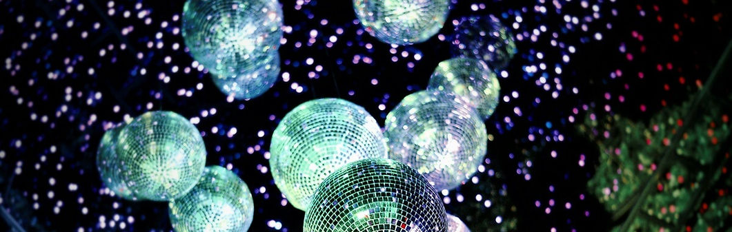 Disco balls creating a vibrant wedding atmosphere with BLVD Entertainment in Redondo Beach.