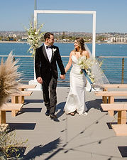 Wedding couple celebrating at Tower Beach Club on Mission Bay, San Diego