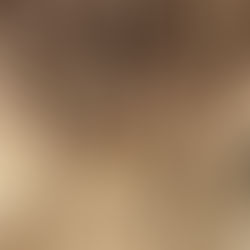 Close up of gradient blonde curly hair
