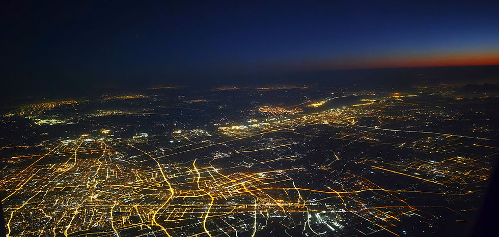 Shanghai at dawn viewed from a jet aircraft representing new begins in high net worth divorce in China Shaghai Kaimao LLP