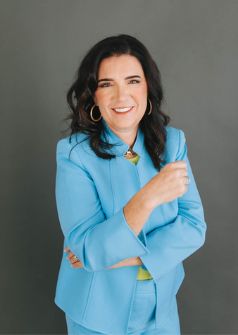 Professional headshot of Atlanta business professional with natural expression