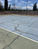 Cómo reparar una cancha de tenis o multicancha correctamente (guía profesional 2026)