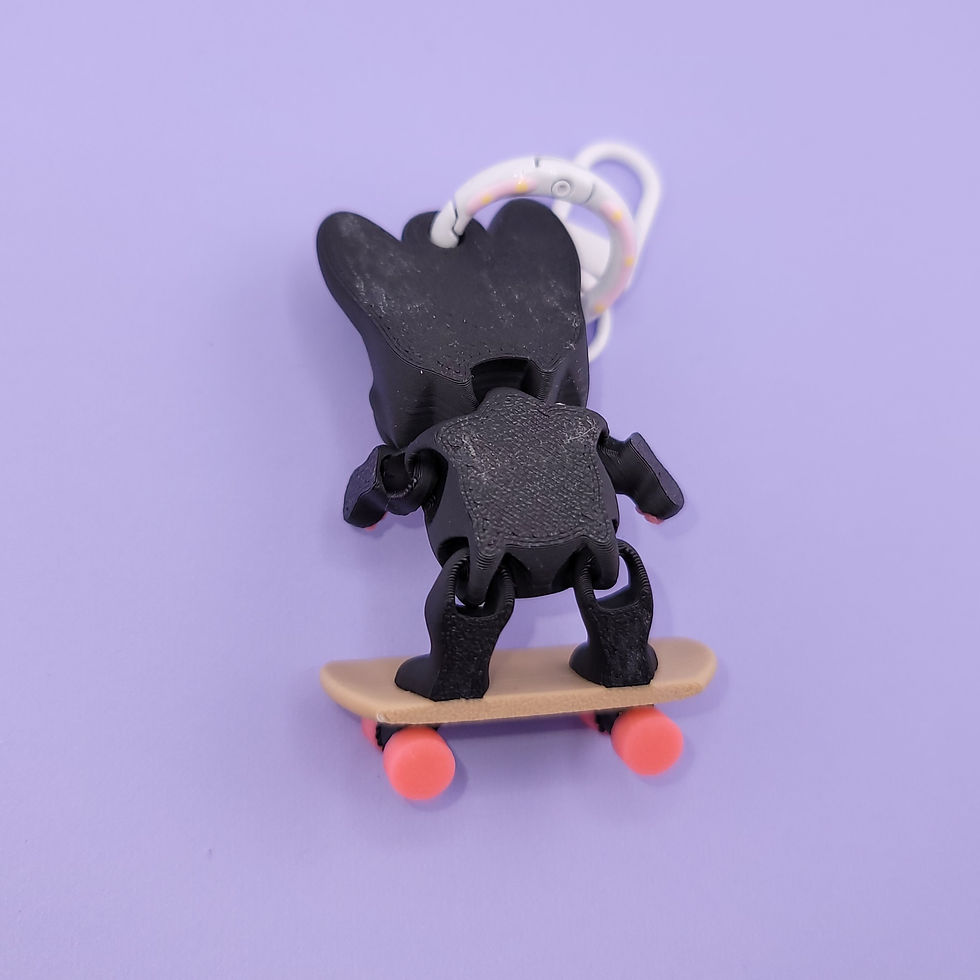 Thumbnail: Skater Frenchie (Black) Wiggly Keychain