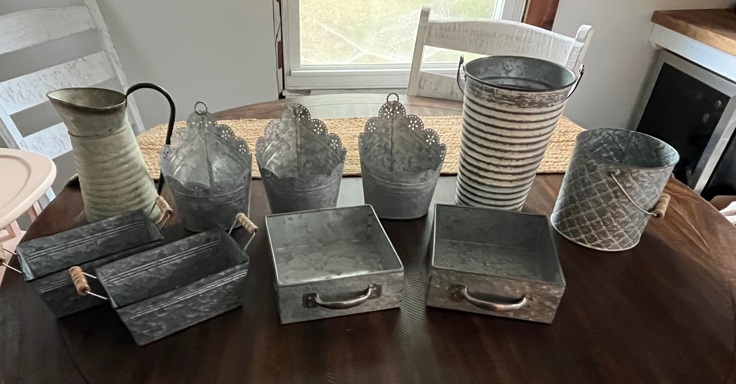 Assorted metal buckets and trays