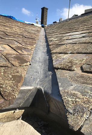 Leadwork and tile repair on period property