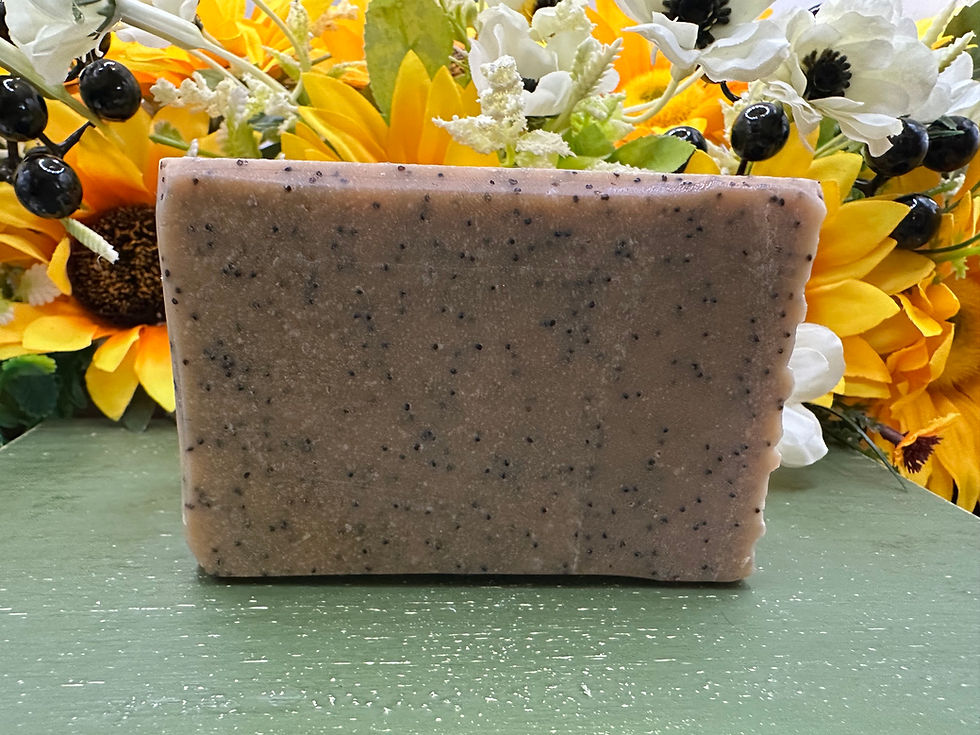 The back side of the honey oats bar of soap to the the poppyseeds.