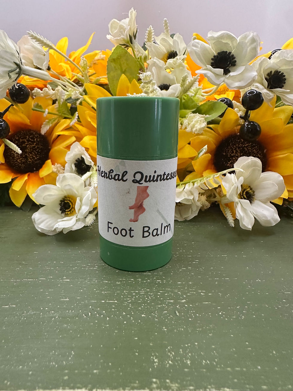 A single stick of foot balm that contains beef tallow, goats milk, cupuaca butter, lanolin, shea butter and other oils/butter.