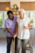 male-social-worker-taking-care-old-woman copy.jpeg