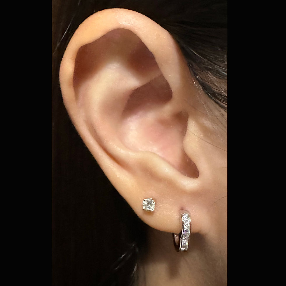 Thumbnail: Silver Huggie Heart Shaped Earrings