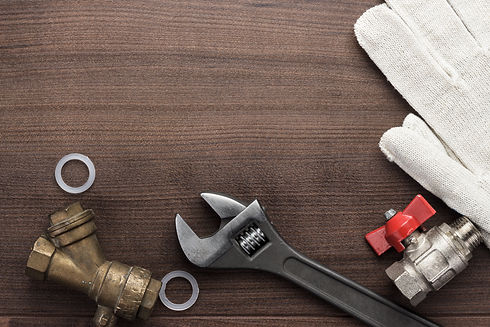 adjustable-wrench-and-pipes-2021-08-26-16-18-08-utc.jpg