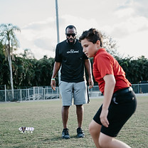 Coach L during a session