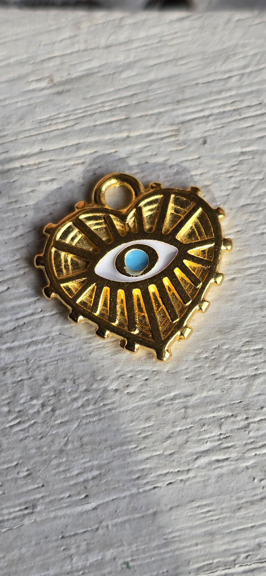 breloque coeur et oeil bleu