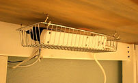 img alt hooks under the dest for a dust free office