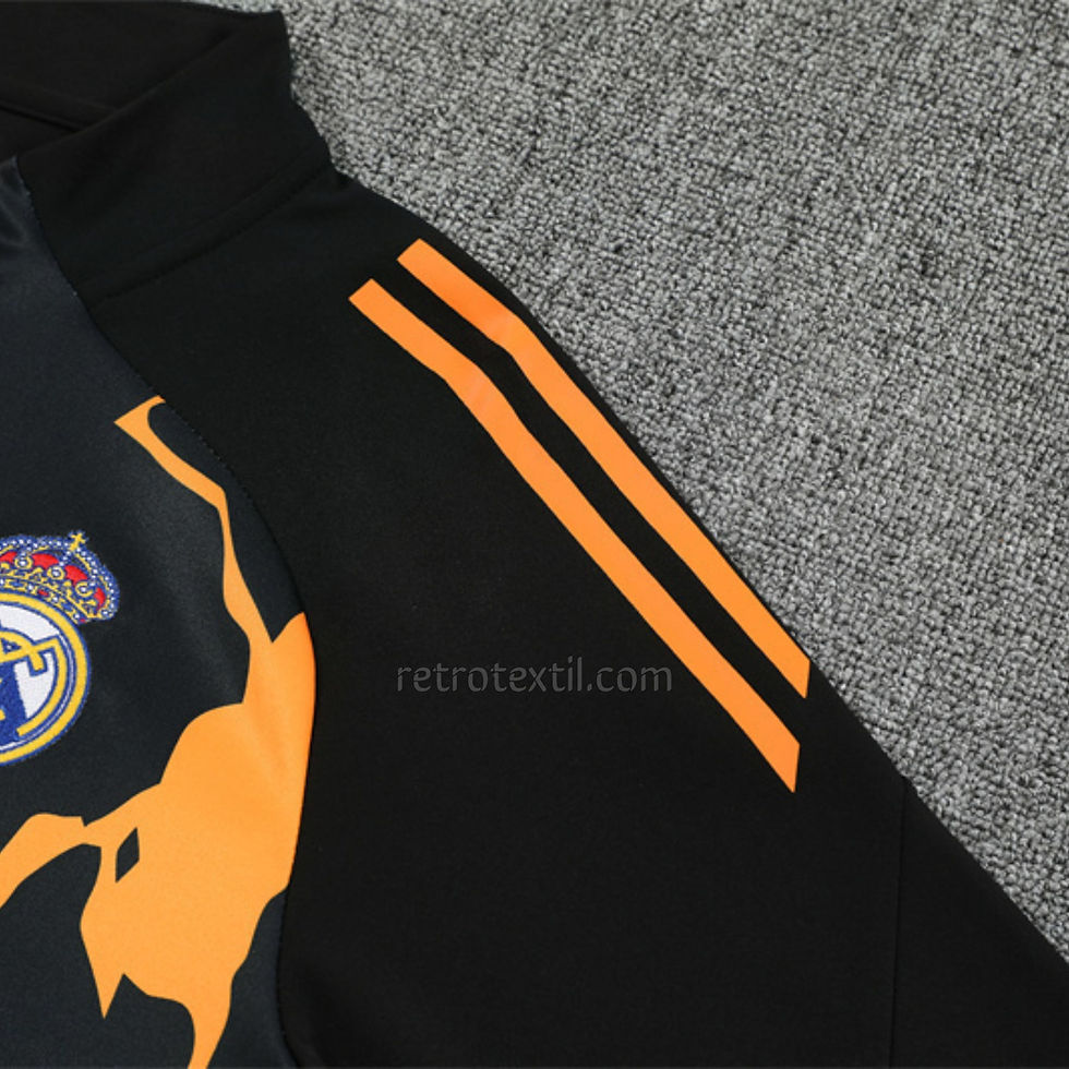 Miniatura: Chándal Niño Real Madrid 25/26 Negro Naranja