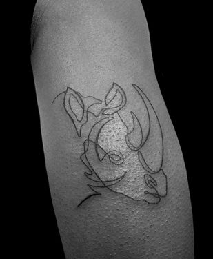 single line tattoo of rhinoceros 