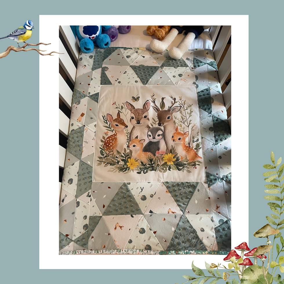 Handmade patchwork baby blanket — Woodland Whispers, central deer panel with patchwork border, made in Ireland The Owl Tree