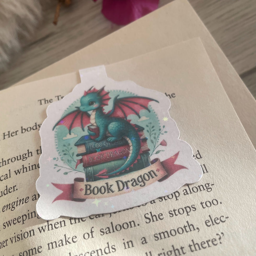 Thumbnail: handmade glittery magnetic bookmark clipped over a page in a book