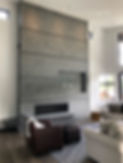 A grey Venetian Plaster fireplace