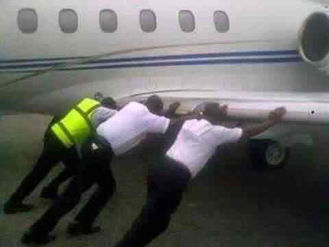 Wonder Shall Never End!! See Photo Of Airport Official Pushing Aeroplane