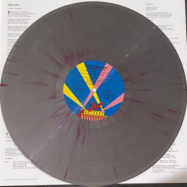 The Silver coloured vinyl record with a red swirl effect