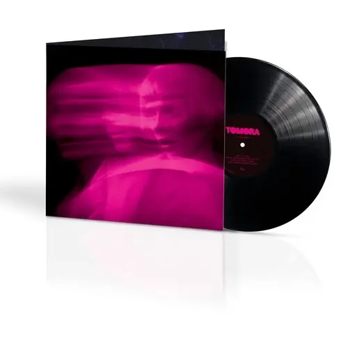Tomora Come Closer cover featuring a blurred all pink image of band member Aurora.