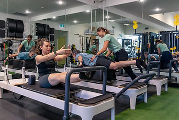 Rehabilitation clients exercising in the Aeon Health gym during a class