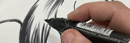 a hand drawing with marker close up
