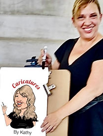 caricature artist kathy buskett smiles from her easel