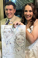 a wedding couple getting their caricature drawn in fairhope AL at little point clear