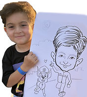 kid holding a paw patrol themed drawing