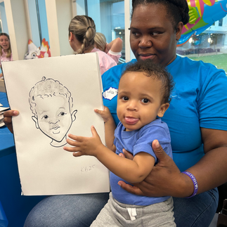 a mom and her little boy pose for a caricature