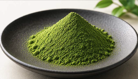 A bowl of green matcha powder