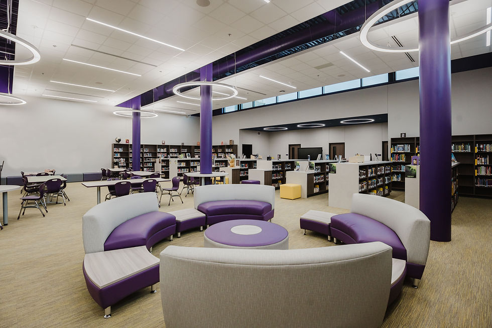 A media center with bright lighting and comfy seating