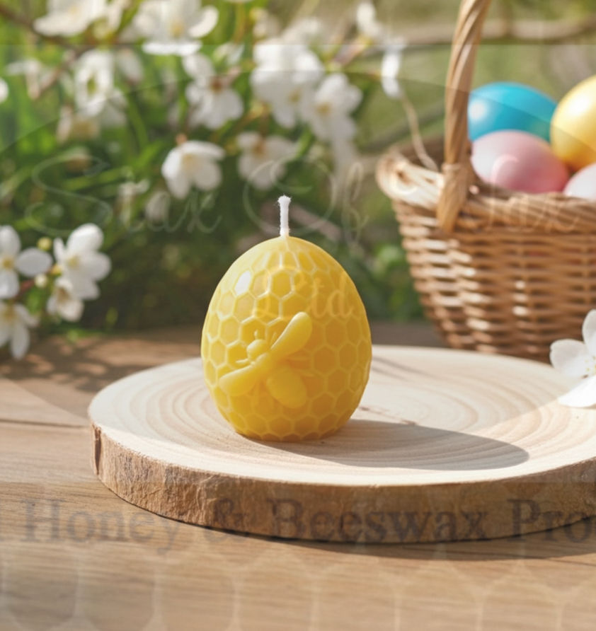 Handmade beeswax egg candle with hexagonal and bee details