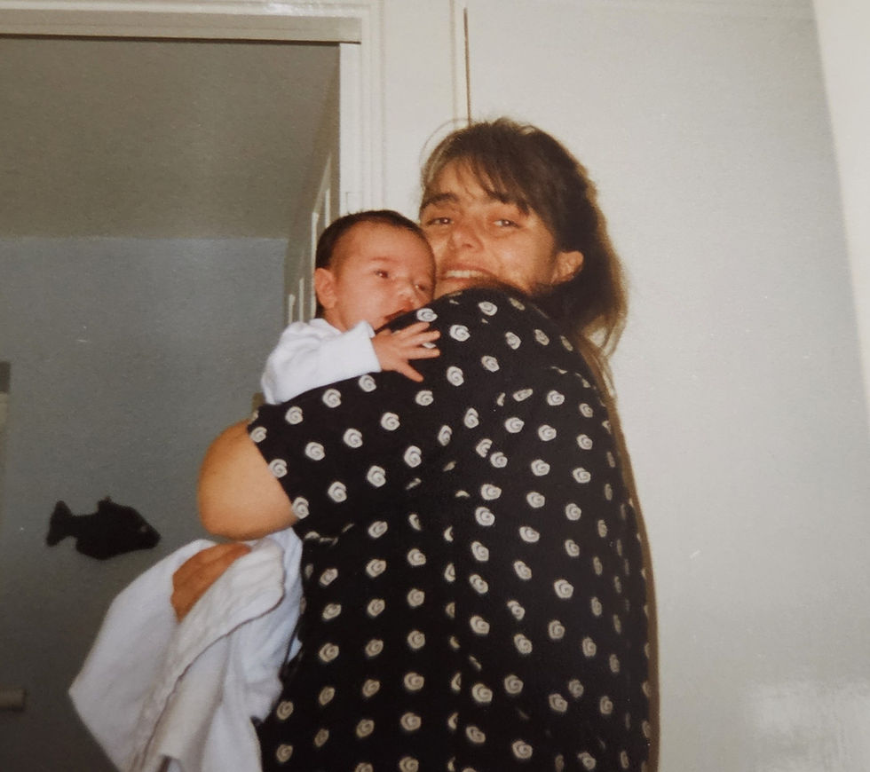 Me with my daughter, just a few weeks old, in 1996.