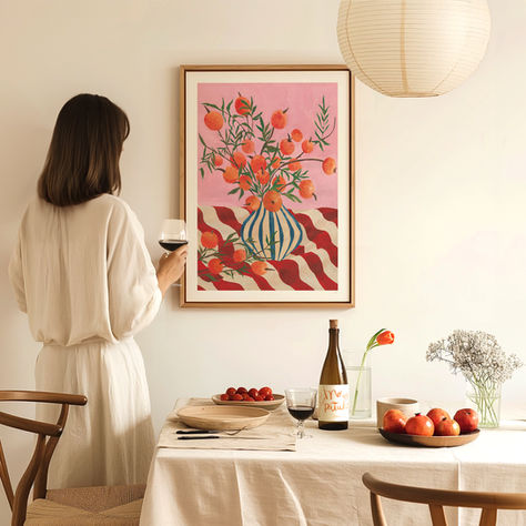 an elegant print of a vase of clementines