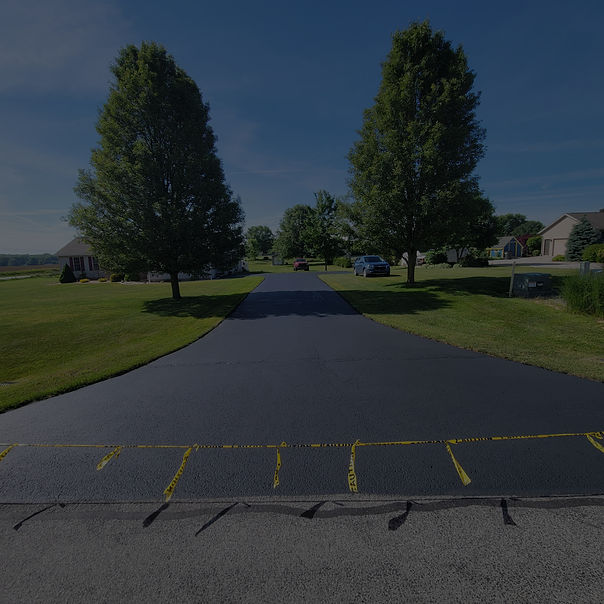 Holmes County Ohio driveway with a fresh coat of sealcoating