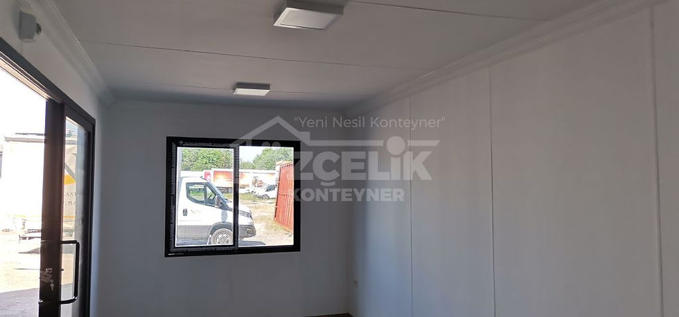 Küçük resim: Betopan üzeri ahşap kaplama detayına sahip konteyner yapı