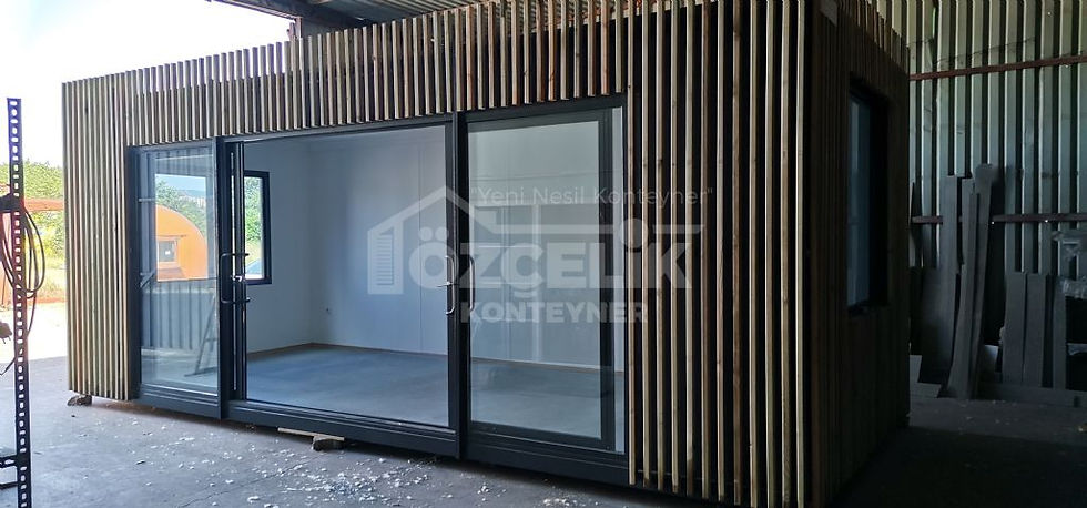 Küçük resim: Geniş camlı antrasit doğramalı modern konteyner ofis