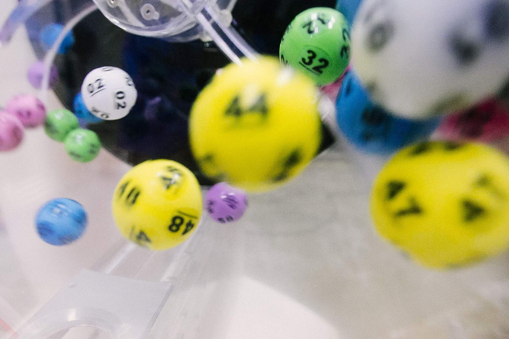 Many Loterry Balls in Motion