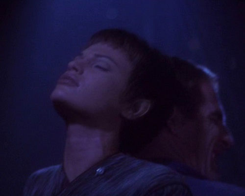 T'Pol looking frustrated, while tied to a chair.