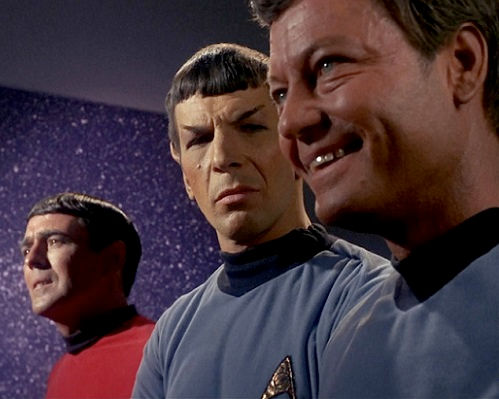 McCoy and Scotty find themselves enraptured by the new arrivals. Spock appears to find this distasteful.