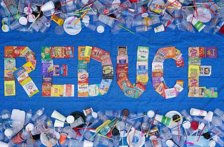 trash art spelling the word reduce