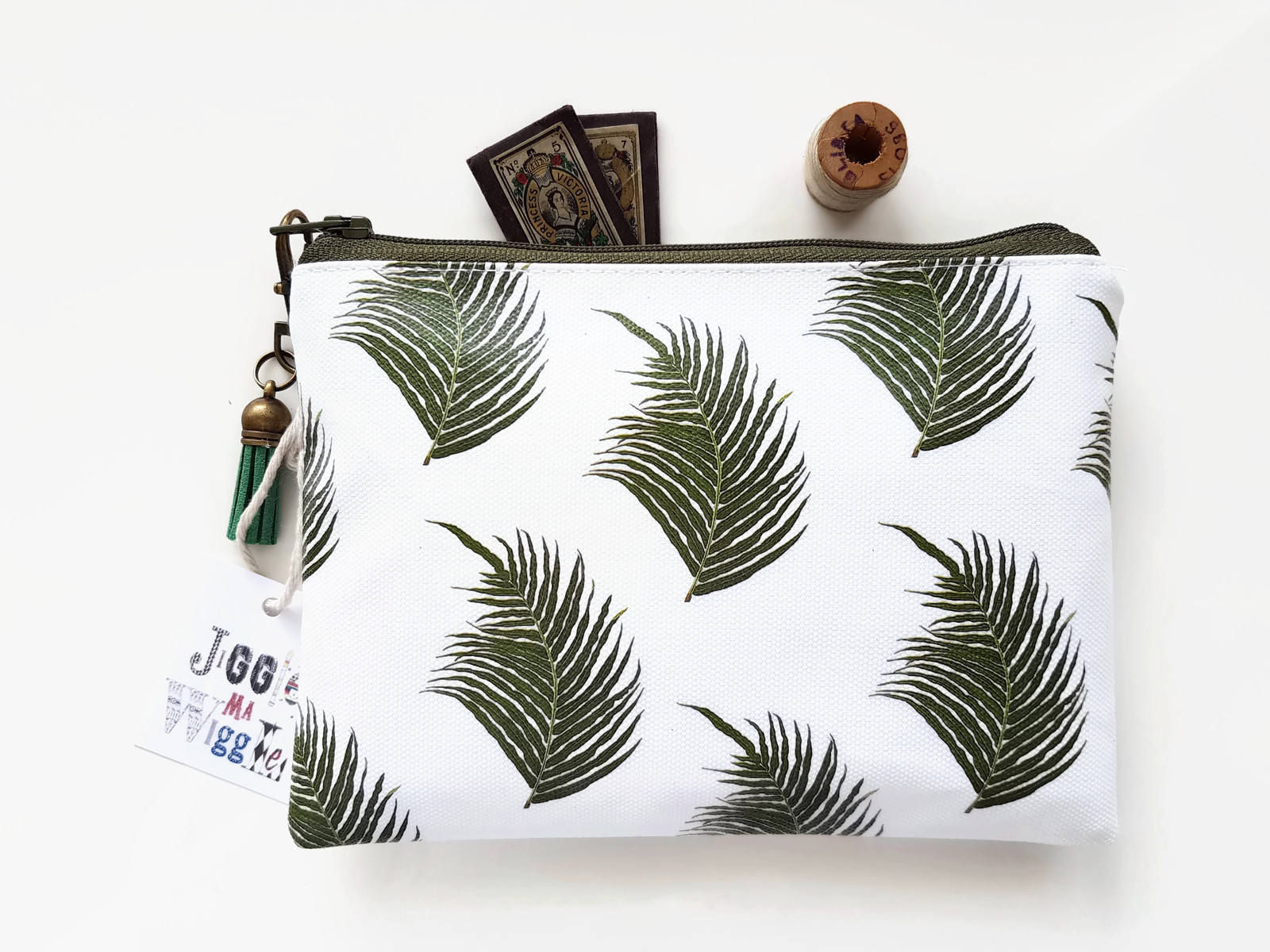Fern print vegan vinyl zipper wallet.