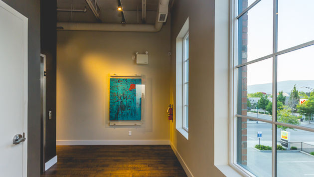 Elevator accessible office space for lease in South Pandosy with large windows. 